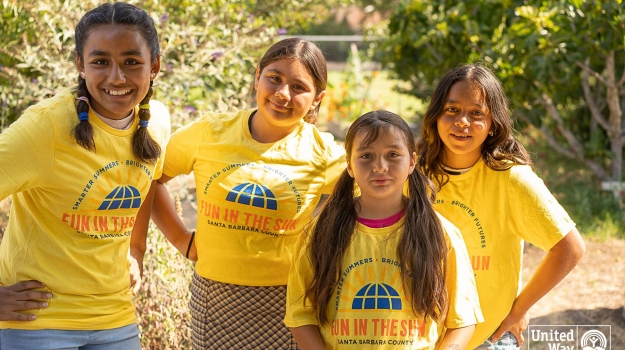 Group of girls wearing Fun in the Sun T-shirts